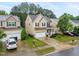 Aerial view of home showing mature trees, front lawn, driveway and two car garage at , Knightdale, NC 27545