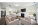 Bright living room with fireplace, hardwood floors, and contemporary furnishings at , Knightdale, NC 27545