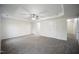 Spacious primary bedroom with trey ceiling, carpet, and ensuite bath entrance at , Knightdale, NC 27545