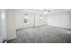 Spacious main bedroom with tray ceiling and two windows for natural light at , Knightdale, NC 27545