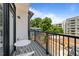 Relaxing balcony with furniture provides an inviting outdoor space to enjoy the view at 710 W North St # 103, Raleigh, NC 27603