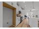 Modern kitchen featuring stainless steel appliances, white cabinetry, and an island with bar seating at 710 W North St # 103, Raleigh, NC 27603