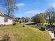 Charming street view showcasing the well-maintained landscaping at 720 Rawls Dr, Raleigh, NC 27610