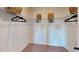 Walk-in closet with organized shelving and hanging space, providing ample storage solutions in a compact design at 75 E American Marigold Dr # 37, Benson, NC 27504