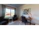 Home office with natural light, refined decor, an executive desk, and comfortable seating, blending productivity and style at 75 E American Marigold Dr # 37, Benson, NC 27504