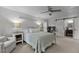 Spacious bedroom with a work space and a sliding barn door to the bathroom at 7517 Chippenham Ct, Raleigh, NC 27613