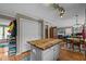 Eat-in kitchen features wood cabinets, a butcher block island, and an open layout for entertaining at 7621 Troy Stone Dr, Fuquay Varina, NC 27526