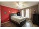 Stylish bedroom featuring modern furniture, hardwood flooring, and bright natural light at 780 Pondview Ct, Rocky Mount, NC 27804
