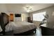 Primary bedroom with a ceiling fan, TV, exercise bike, and hard surface flooring at 780 Pondview Ct, Rocky Mount, NC 27804
