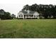 Inviting single-Gathering home with a manicured lawn, charming front porch, and classic curb appeal at 780 Pondview Ct, Rocky Mount, NC 27804