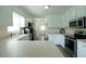 Bright kitchen with updated appliances, ample counter space, and white cabinetry at 780 Pondview Ct, Rocky Mount, NC 27804