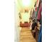 Walk-in closet with a wood chest, shelving, and rods for hanging clothes and storage at 780 Pondview Ct, Rocky Mount, NC 27804