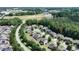 Community aerial view shows neighborhood near a school and recreational area at 82 Idlewood Ln, Clayton, NC 27527