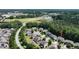 Community aerial view showcases neighborhood layout and surrounding trees at 82 Idlewood Ln, Clayton, NC 27527
