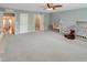 Spacious bedroom featuring a crib, carpet, and an open closet at 82 Idlewood Ln, Clayton, NC 27527