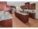 Well-appointed kitchen featuring granite countertops, stainless steel appliances, and ample cabinet space at 82 Idlewood Ln, Clayton, NC 27527