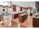 Spacious kitchen with center island, stainless steel appliances, and rich wood cabinetry at 82 Idlewood Ln, Clayton, NC 27527