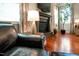 Comfortable seating area with a fireplace and views of the outdoors at 82 Idlewood Ln, Clayton, NC 27527