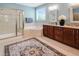 Bright and airy main bathroom with a soaking tub, shower, and double vanity at 82 Idlewood Ln, Clayton, NC 27527