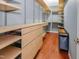 Custom walk-in closet with ample shelving and drawer space for organization at 82 Idlewood Ln, Clayton, NC 27527