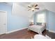 Bright bedroom with hardwood floors and a comfortable bed at 821 Laurel Garden Way, Cary, NC 27513