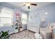 Charming Bedroom with a crib, soft carpet, and natural light at 821 Laurel Garden Way, Cary, NC 27513