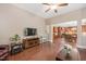 Bright living room featuring hardwood floors and open access to the kitchen at 821 Laurel Garden Way, Cary, NC 27513