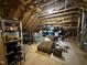 Unfinished attic space with furniture, shelving and storage at 821 Laurel Garden Way, Cary, NC 27513