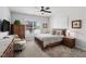 Well-lit bedroom with a cozy bed, ample closet space, and a large window providing natural light at 901 Del Webb Manor Ave, Wake Forest, NC 27587