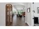 Elegant foyer with hardwood floors and an arched doorway leading to the living areas at 901 Del Webb Manor Ave, Wake Forest, NC 27587
