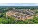 Aerial view showcases a new residential community under development with scenic landscaping at 910 Kensley Grove Ln # 70, Fuquay Varina, NC 27526