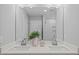 Elegant primary bathroom with double vanity, white cabinets, and glass-enclosed shower at 910 Kensley Grove Ln # 70, Fuquay Varina, NC 27526