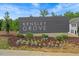 Kensley Grove community sign surrounded by flowers and greenery; a welcoming entrance at 910 Kensley Grove Ln # 70, Fuquay Varina, NC 27526
