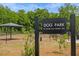 Kensley Grove's dog park, a resident's area, features shade, play areas and a bench at 910 Kensley Grove Ln # 70, Fuquay Varina, NC 27526