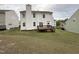 Spacious backyard with a wooden deck, great for outdoor entertaining and relaxation at 10 Gwendolyn Cir, Durham, NC 27703