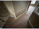 Hallway with staircase in need of renovation at 10 Gwendolyn Cir, Durham, NC 27703