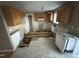 Spacious kitchen is in need of renovation and repair at 10 Gwendolyn Cir, Durham, NC 27703