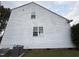 The siding on the exterior wall could use a clean, but has a brick base, and well placed windows at 10 Gwendolyn Cir, Durham, NC 27703