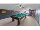 Recreation room with a pool table, lounge chairs, and a vintage decor at 1004 Taywood Way, Apex, NC 27502
