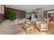 Comfortable living room with hardwood floors, neutral furniture, and bright, natural light at 1004 Taywood Way, Apex, NC 27502