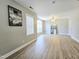 Large bonus room with plenty of light, ceiling fan, and vinyl flooring at 1039 Bellenden Dr, Durham, NC 27713