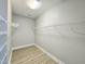 Spacious closet with wire shelving and modern flooring at 1039 Bellenden Dr, Durham, NC 27713