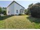 Exterior home elevation showing manicured lawn and lush landscaping at 1039 Bellenden Dr, Durham, NC 27713