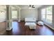 Open living room with hardwood floors, natural light, and a modern design at 1039 Bellenden Dr, Durham, NC 27713