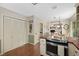 Cozy kitchen with wood floors, wood countertops, and an electric stovetop at 108 Farren Ct, Cary, NC 27511