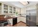 Bright kitchen featuring white cabinetry, wood countertops, and stainless steel appliances at 108 Farren Ct, Cary, NC 27511