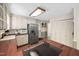 Traditional kitchen with wood countertops, stainless steel appliances, and ample cabinet space at 108 Farren Ct, Cary, NC 27511