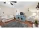 Stylish living room boasting a modern media center, and plush seating for relaxation at 108 Farren Ct, Cary, NC 27511