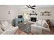 Comfortable living room featuring a decorative fireplace, and ample seating at 108 Farren Ct, Cary, NC 27511