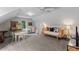 Spacious bonus room offers plush carpeting, ample lighting, playhouse, and versatile layout for endless possibilities at 10817 Brass Kettle Rd, Raleigh, NC 27614